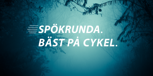 En mörk och kuslig skog med texten "Spökrunda - bäst på cykel."